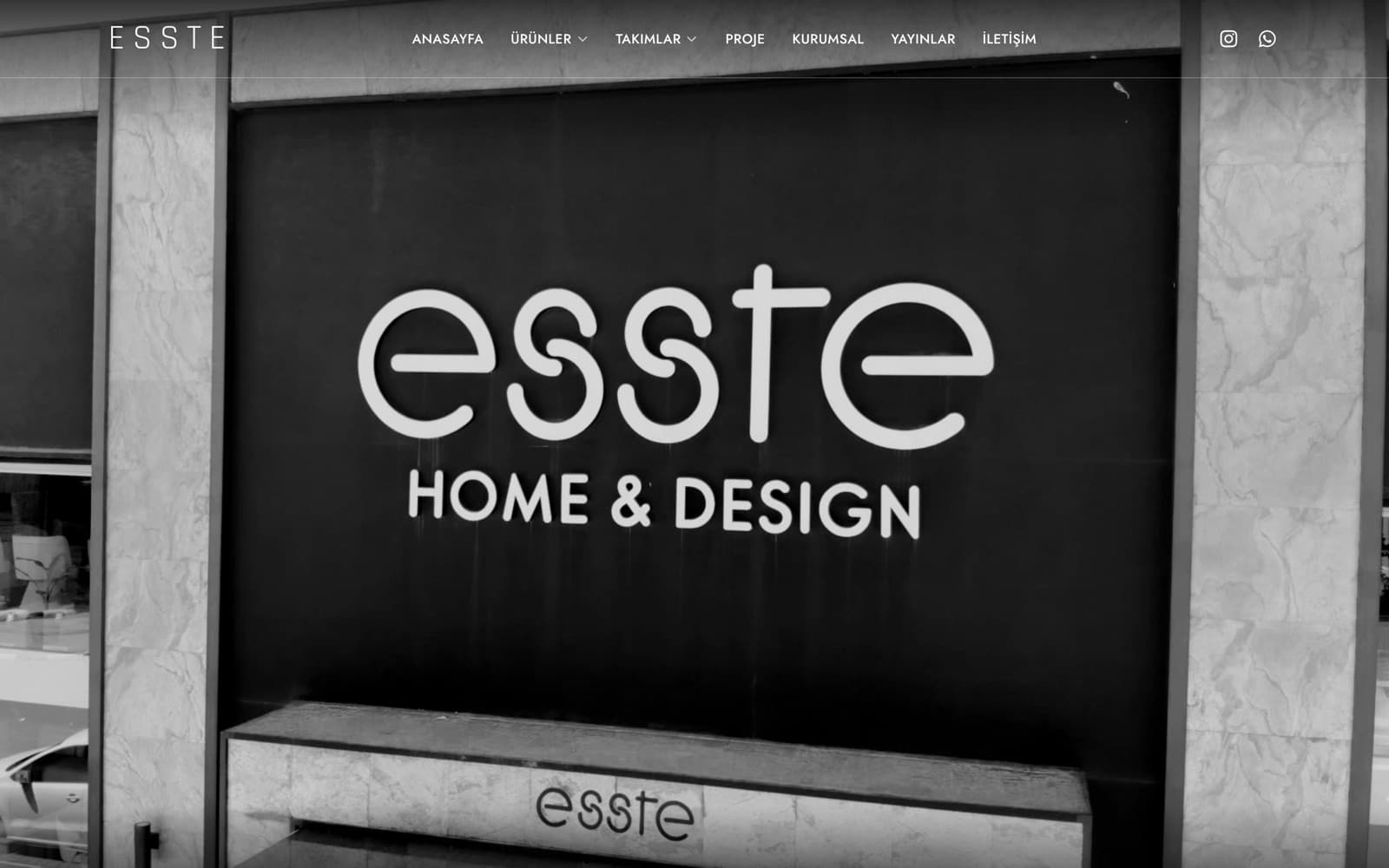Screenshot of the Esste Home Design home page: the Esste Home & Design sign on the showroom front, below the main menu